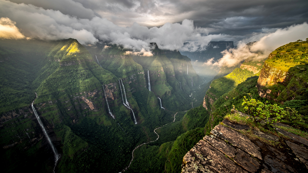 Panoramic vista from Lion's Point showing misty Sahyadri valleys and waterfalls